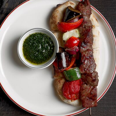 Шашлык из говядины, печеные овощи, соус томатный в Dacha restaurant по цене 1370 ₽
