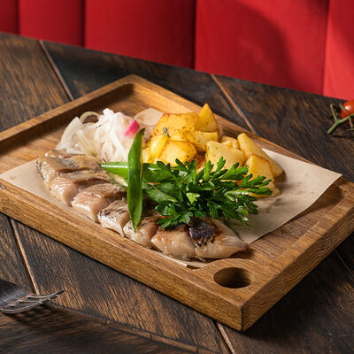 Сельдь малосольная с картофелем в Kinza по цене 455 ₽