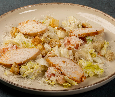 Салат Цезарь в Uno - завтраки весь день по цене 499 ₽