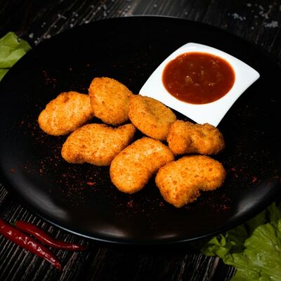 Куриные наггетсы в УГОЛЬ&МЯСО по цене 323 ₽