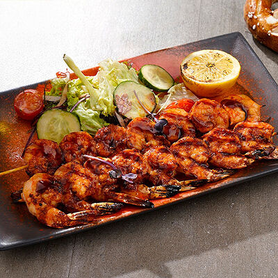 Хвосты тигровых креветок в Paulaner по цене 1475 ₽