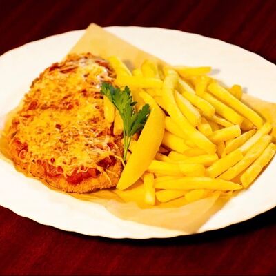 Индейка Пармиджано в Paddy's Irish Pub & Eatery по цене 940 ₽