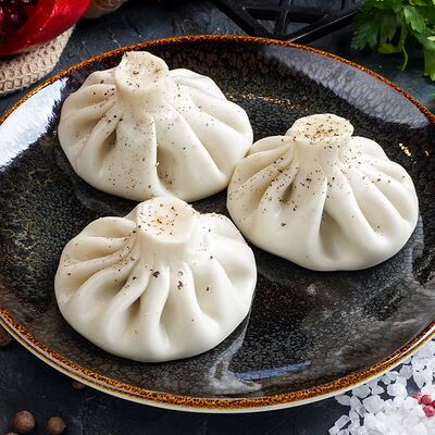 Хинкали с сыром сулугуни в Чинтамани по цене 480 ₽