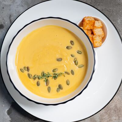 Тыквенный суп с крутонами в ЗоЗо по цене 315 ₽