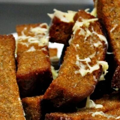 Гренки чесночные в Мераль по цене 200 ₽