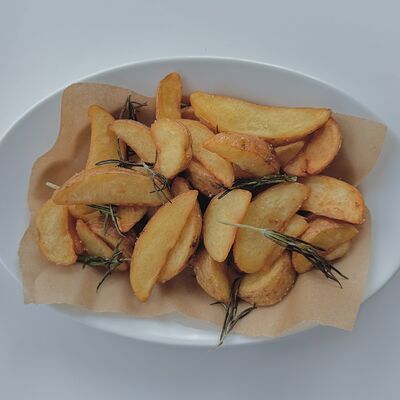 Картофель запеченный с розмарином в Рукоста по цене 390 ₽