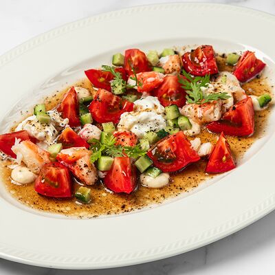 Краб с томатами и страчателлой в Osteria Mario по цене 1125 ₽