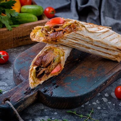 Мегашаурма из курицы в лаваше в Сахара по цене 1050 ₽