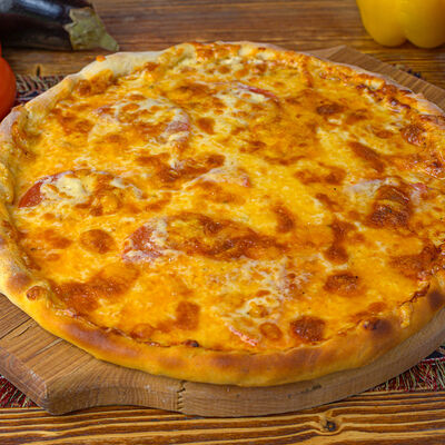 Пицца Четыре сыра в Дом вкуса по цене 1060 ₽