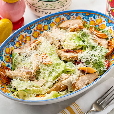 Цезарь с цыпленком на компаниюв Osteria Dolce по цене 1990 ₽