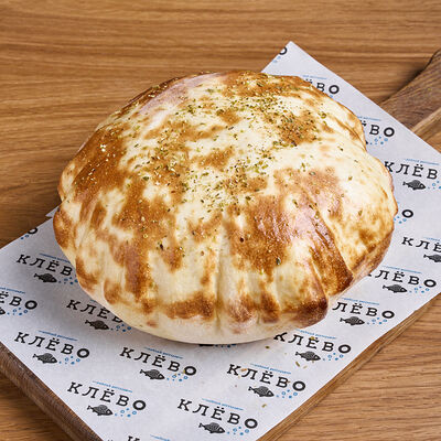 Пшеничная лепешка в Клёво по цене 200 ₽