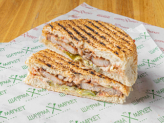 Свиная отбивная в булочке в Шаурма Маркет по цене 555 ₽