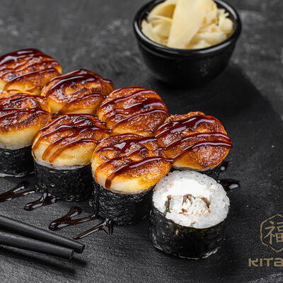 Запеченный ролл с угрем в Kitana по цене 670 ₽