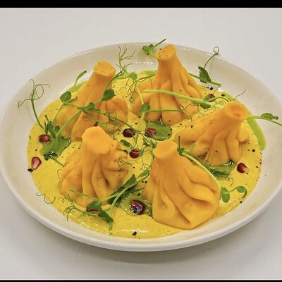 Хинкали с курицей в соусе чкмерули в Лали Хинкали по цене 2770 ₸