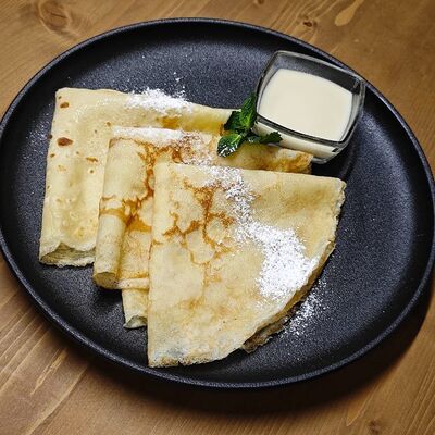 Блинчики со сгущенкой в ATLAS BY CUISINE по цене 320 ₽