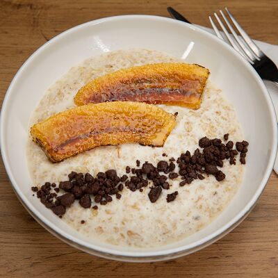 Каша овсяная на кокосовом молоке с бананом в Кофейня Чайка по цене 450 ₽