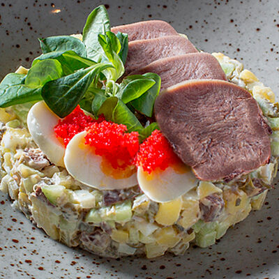 Салат Оливье с языком в Goodman по цене 640