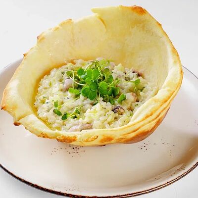 Ризотто с Морепродуктами в Баклажан по цене 1595 ₽