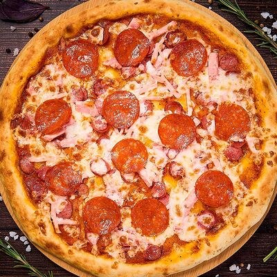 Мясная большая пицца в Татмак по цене 700 ₽