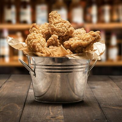 Крылья в панировке 1 кг в Линдерхоф по цене 2295 ₽