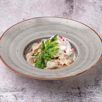 Пельмени на мацони в Афрасиаб по цене 460 ₽