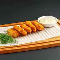 Куриные наггетсы с фирменным томатным соусом в Мясоед - пицца и гриль
