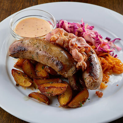 Колбаски гриль с тушеной капустой в Craft Lab Cafe по цене 610 ₽