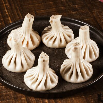 Хинкали с курицей по-азиатски в TATEV по цене 150 ₽