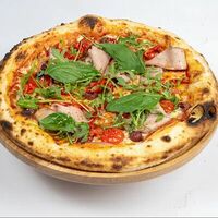 Фирменная пицца Aroma cafe в Aroma