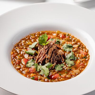 Чечевичный суп с бычьими хвостами в Romano по цене 850 ₽