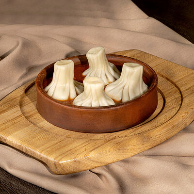 Хинкали патара в соусе чакапули в Аджикинежаль по цене 555 ₽