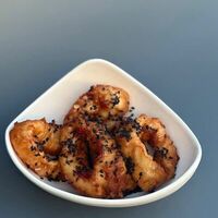 Кольца кальмара в кляре в Сайко