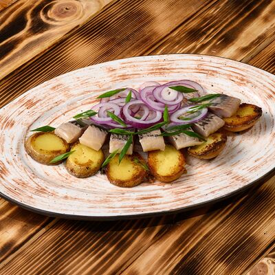 Сельдь с картофелем в Ресторан Мангал по цене 460 ₽