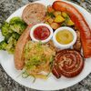 Ассорти немецких колбасок с овощами в Кафе Nебо по цене 1350