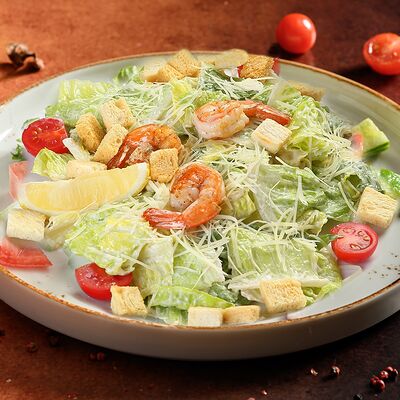 Салат Цезарь с тигровыми креветками в BierBurg по цене 699 ₽