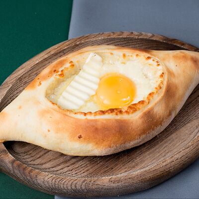 Хачапури по-аджарски в Пиросмани по цене 650 ₽