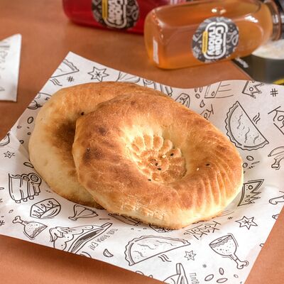 Лепешка узбекская в Слово плову по цене 59 ₽