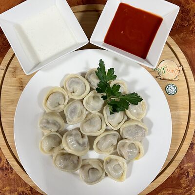 Пельмени с курицей в Чудочуду по цене 280 ₽