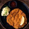 Шницель из свиной вырезки с картофельным салатом и соусом тартар в Golden Coffee по цене 23