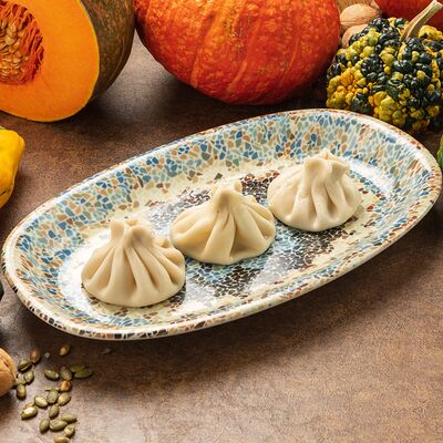 Хинкали с тыквой и лососем 3 штуки в Megobari по цене 690 ₽