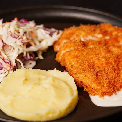 Куриный шницель с пюре в Rogulevs Burgers по цене 580 ₽