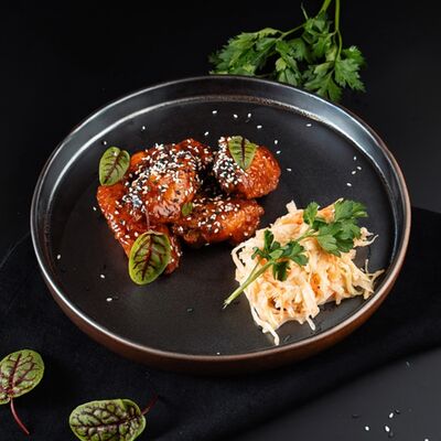 Куриные крылья в соусе BBQ в РАХАТ по цене 580 ₽