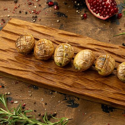 Картошка молодая на мангале в Вкусно есть всё на углях по цене 370 ₽