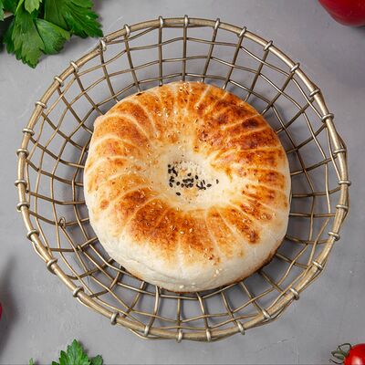 Узбекская лепешка из тандыра в Куркума по цене 190 ₽