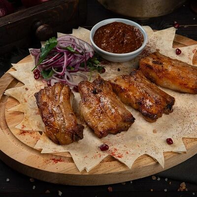 Шашлык из свиных ребер в Мангал Хаус по цене 650 ₽