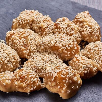 Креветки Панко в соусе Тейсти с кунжутом в Римские пиццы по цене 490 ₽