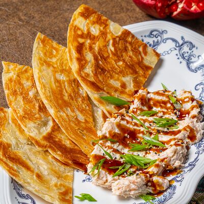 Лепешка с риетом в Шари Вари Чайхана по цене 735 ₽