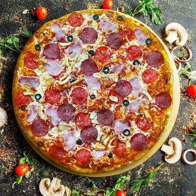 Пицца Мясное ассорти в Едатория по цене 1070 ₽