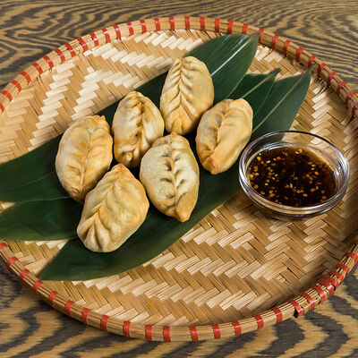 Дамплинги со свининой в Starwok по цене 310