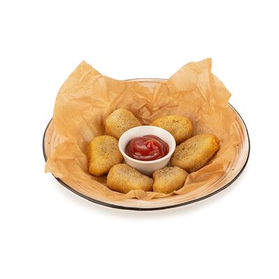 Куриные наггетсы с кетчупом в Trattoria по цене 348 ₽